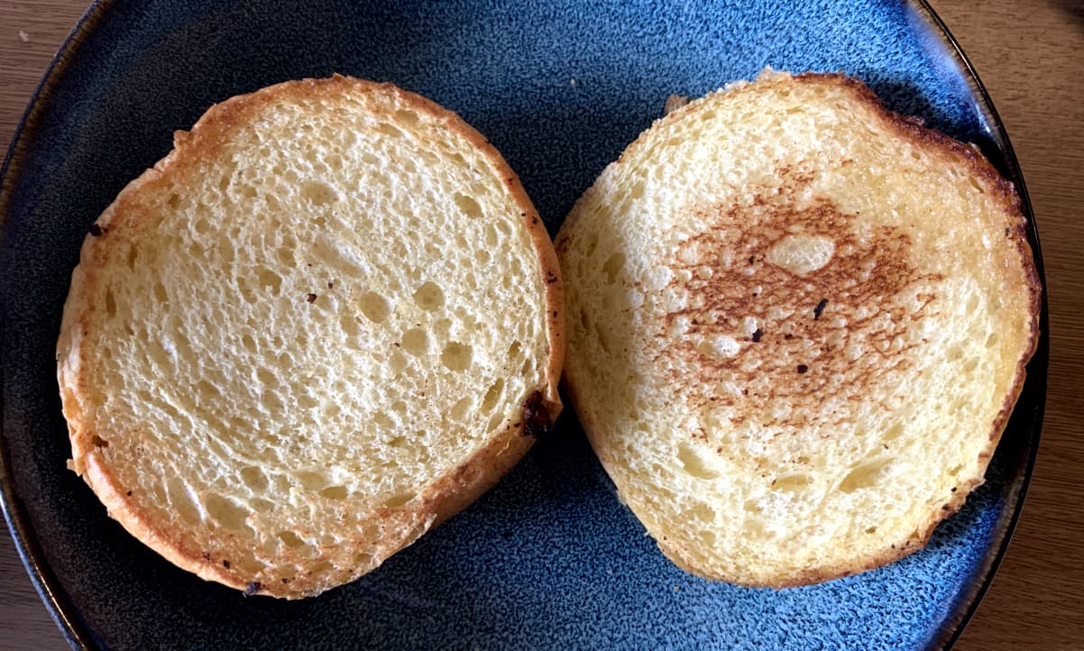 a brioche bun, sliced in two and toasted