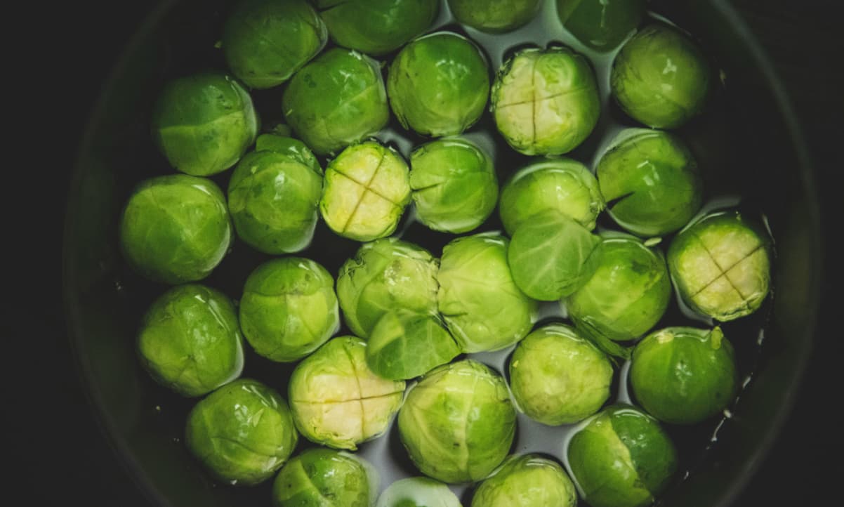 brussel sprouts in a pot full of water