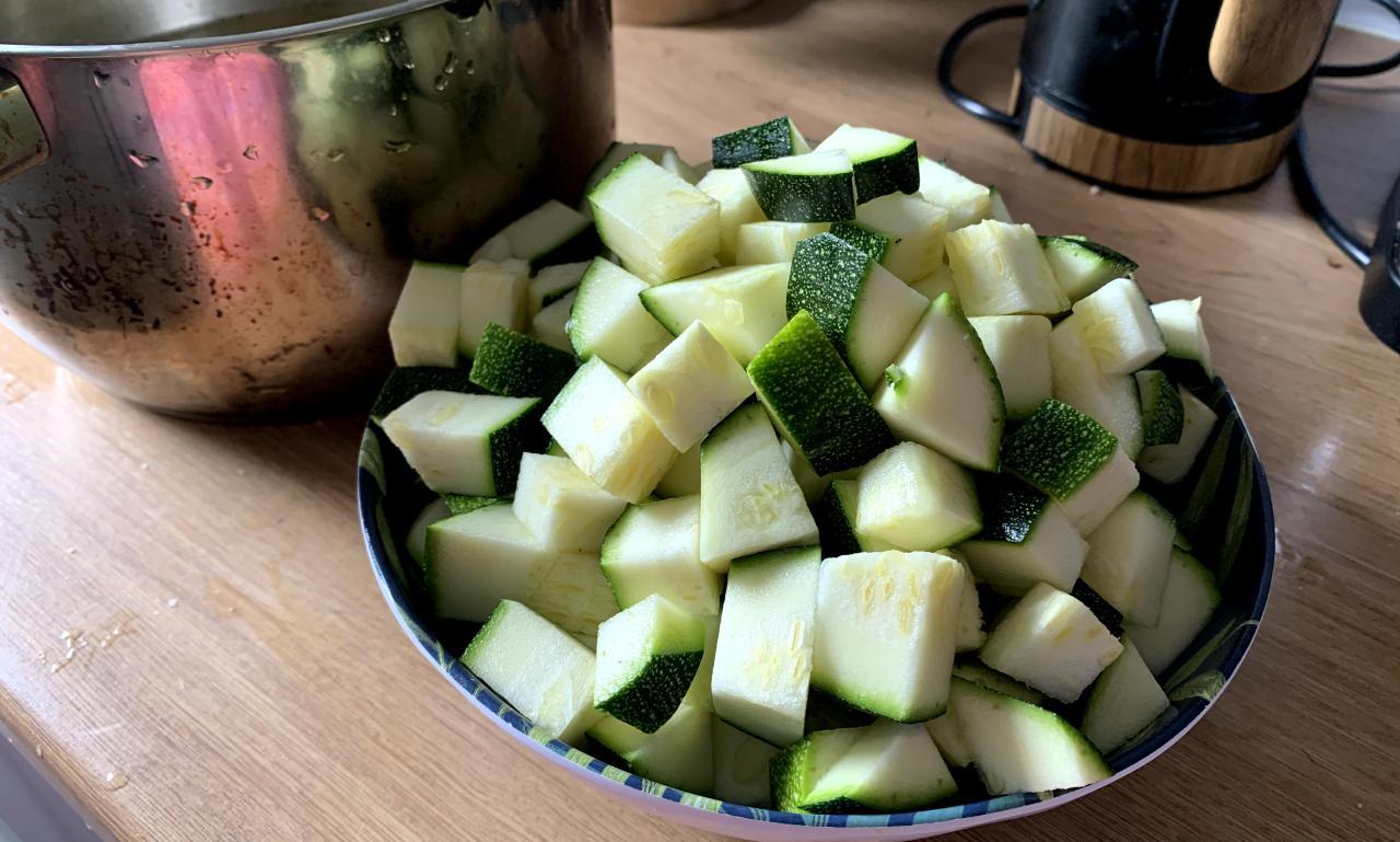 bite-sized cubes of courgette sitting in a bowl