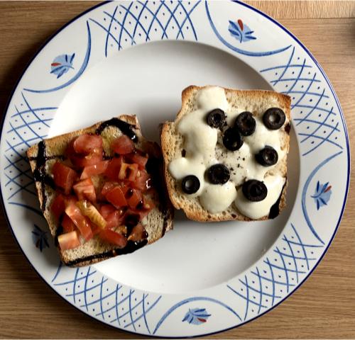 tomatoes, mozzarella and black olives grilled on ciabatta