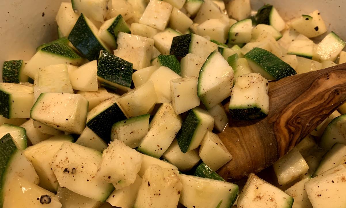 cubes of courgette dusted with nutmeg and black pepper