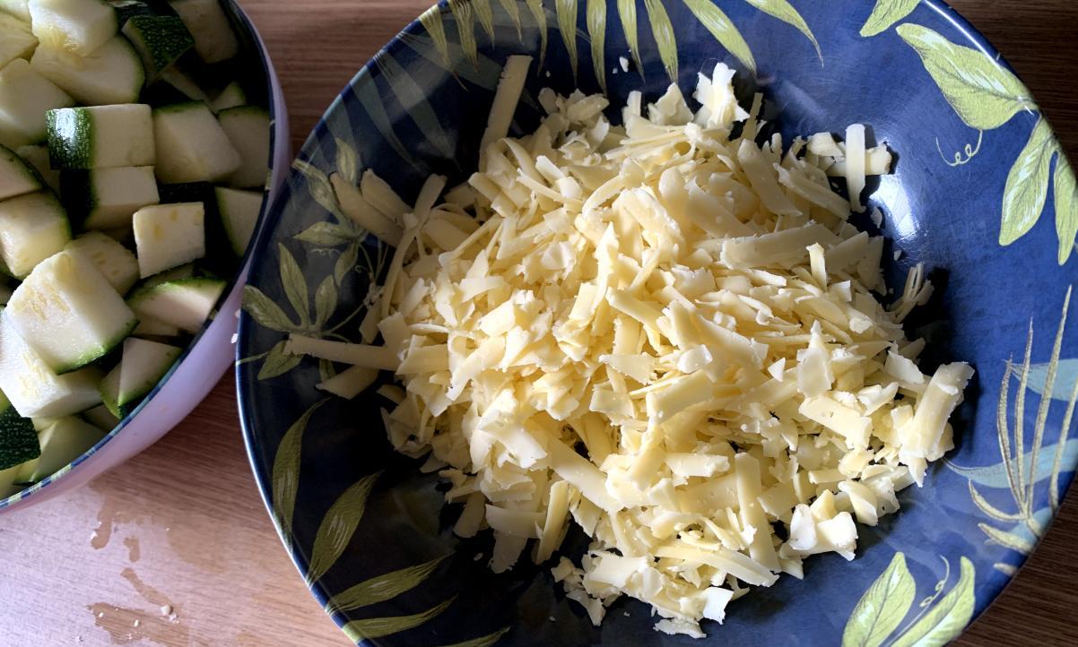 shredded cheddar cheese in a bowl