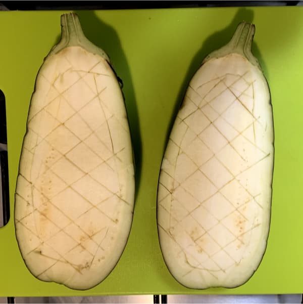 aubergine halves lightly scored